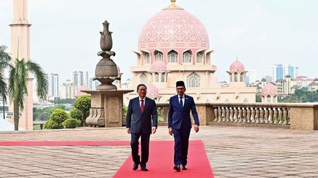 Malaysia, China mark 50 years of ties with deals on development, durians